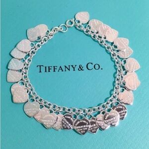 Tiffany & Co. Silver Heart Charm Bracelet with Multiple Hearts